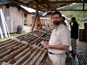 Proud explorationist looking at FDN drill core. 2007